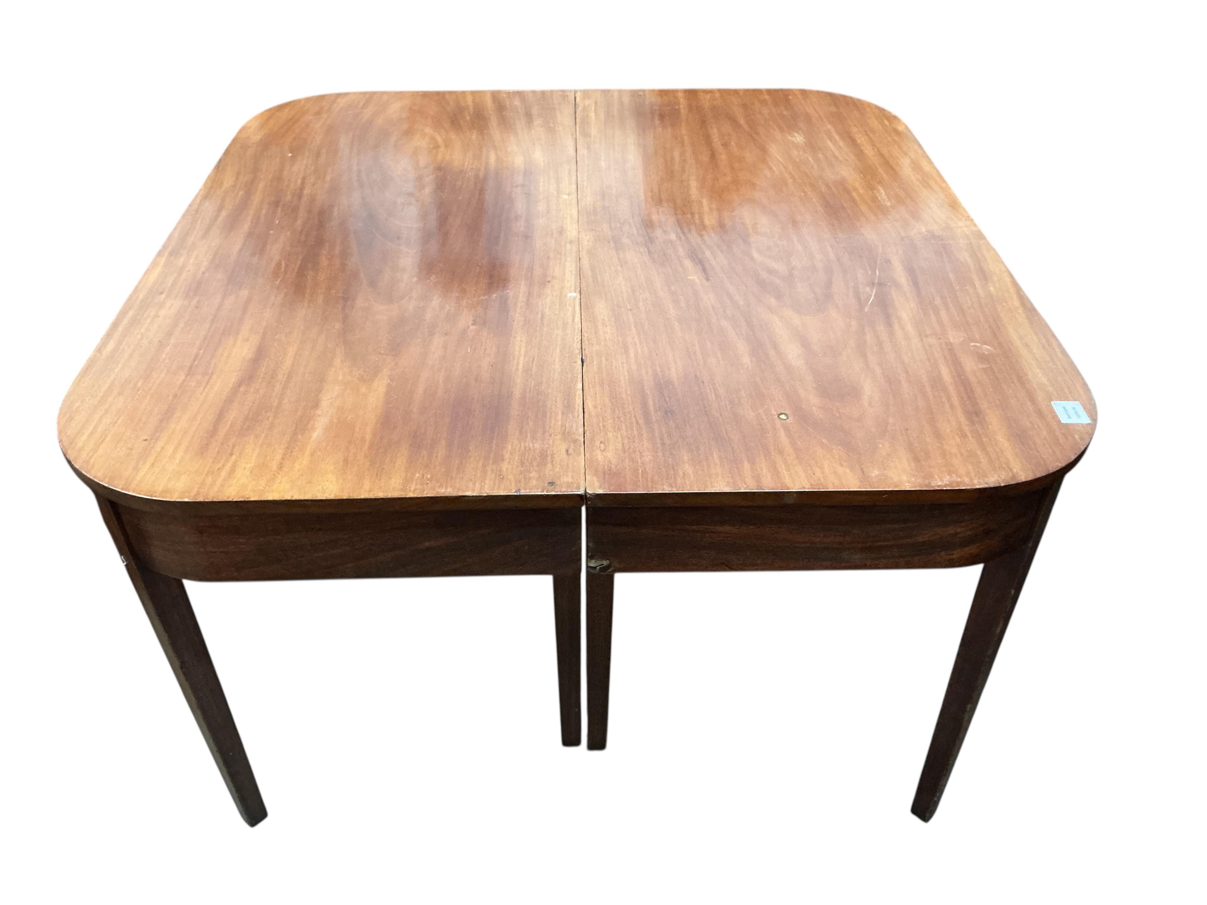 A George III mahogany 'D' end extending dining table, 170cm extended, one spare leaf, no clips for the leaf, depth 120cm, height 73cm
